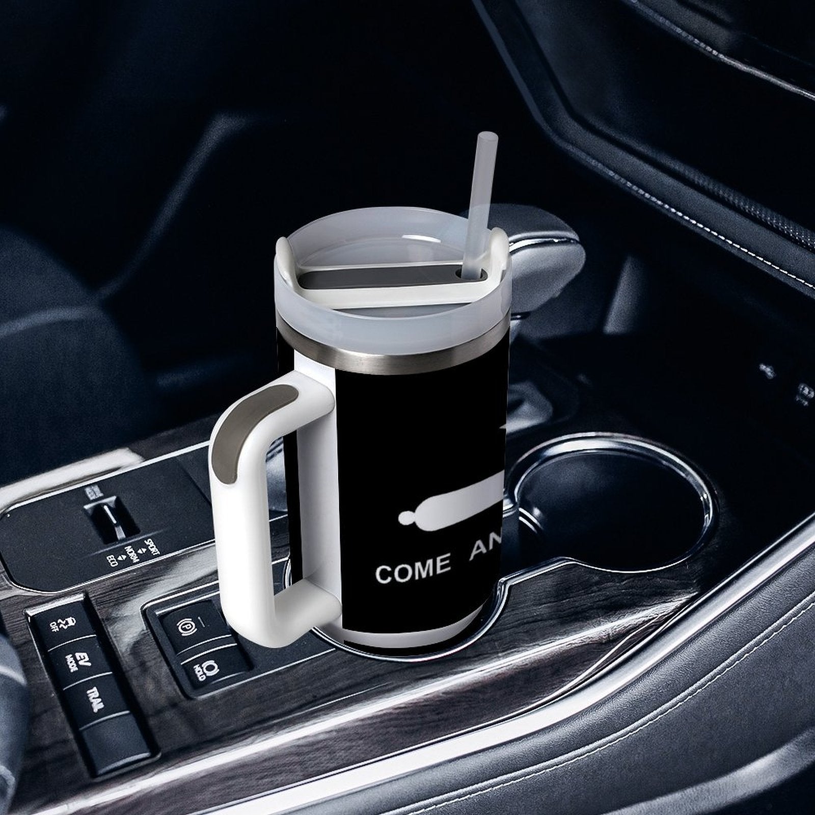 [Brand] travel mug in a car cup holder, black design.