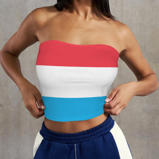 Woman wearing [Brand] color-blocked strapless top and blue shorts.