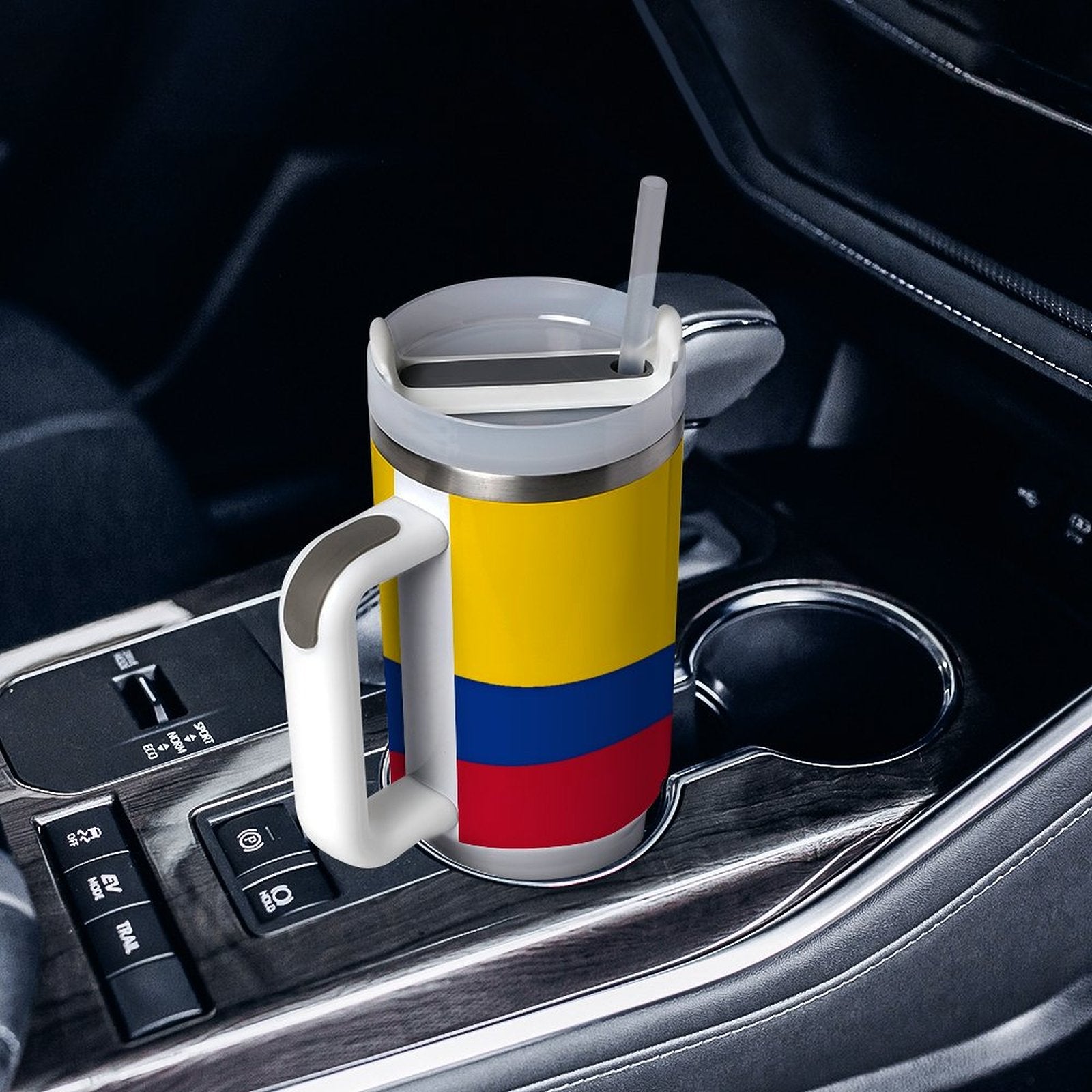 [Brand] mug with Colombian flag in car cup holder.