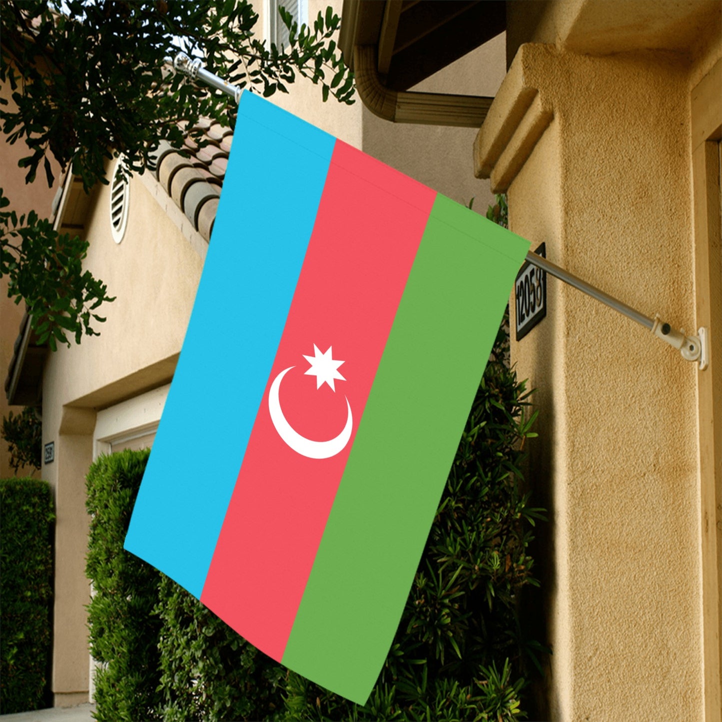 "Luv My Flag Azerbaijan flag displayed outside a house."