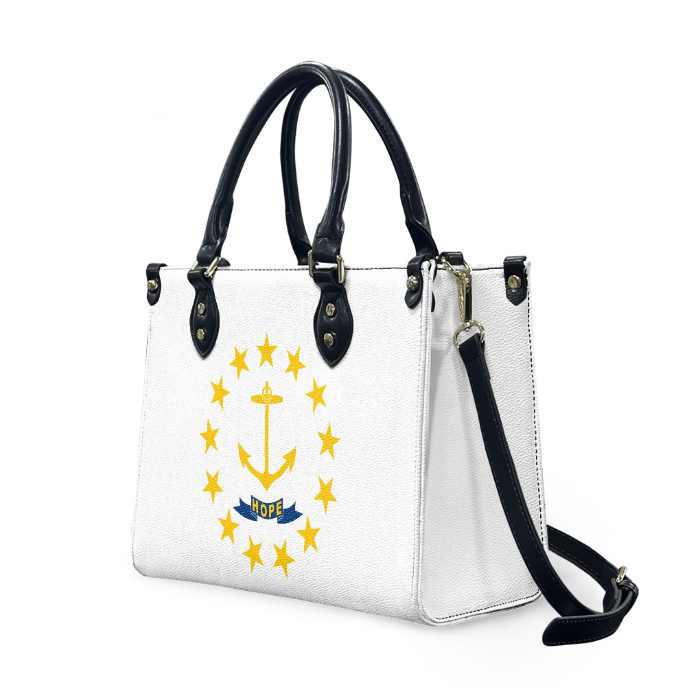 White handbag featuring anchor design, black handles, [Brand].
