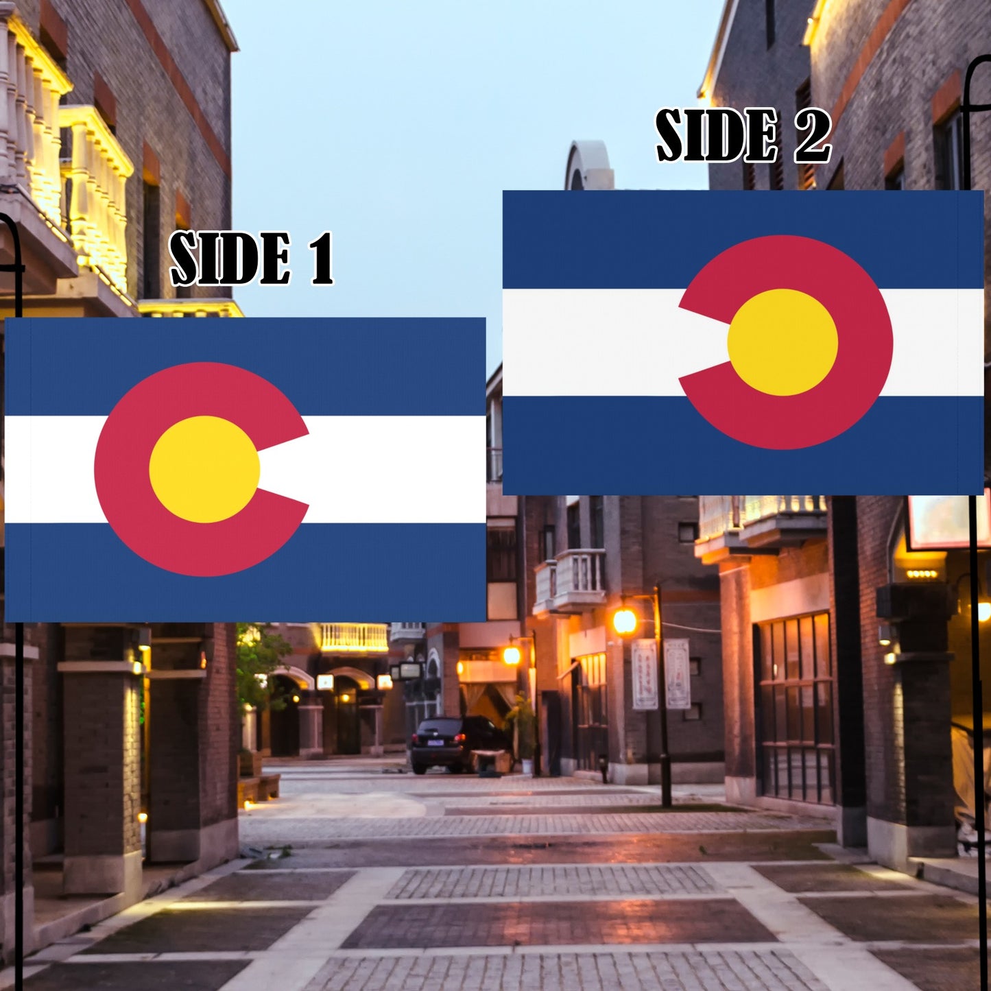 Two Colorado flags by Luv My Flag in alleyway.