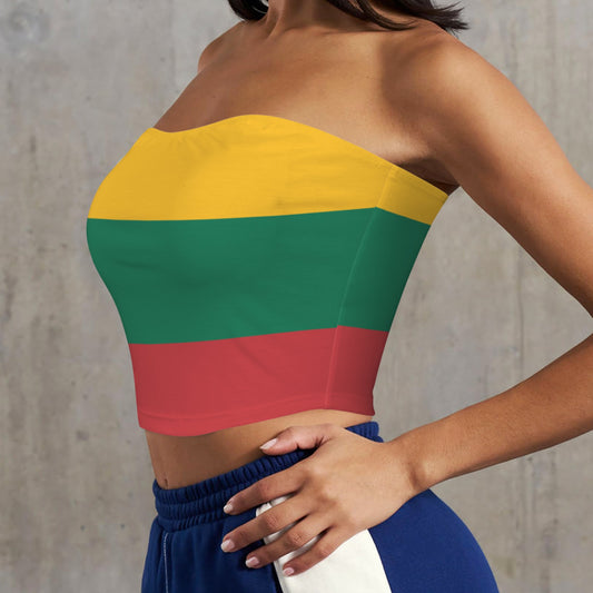 Woman wearing strapless [Brand] top with colorful stripes.