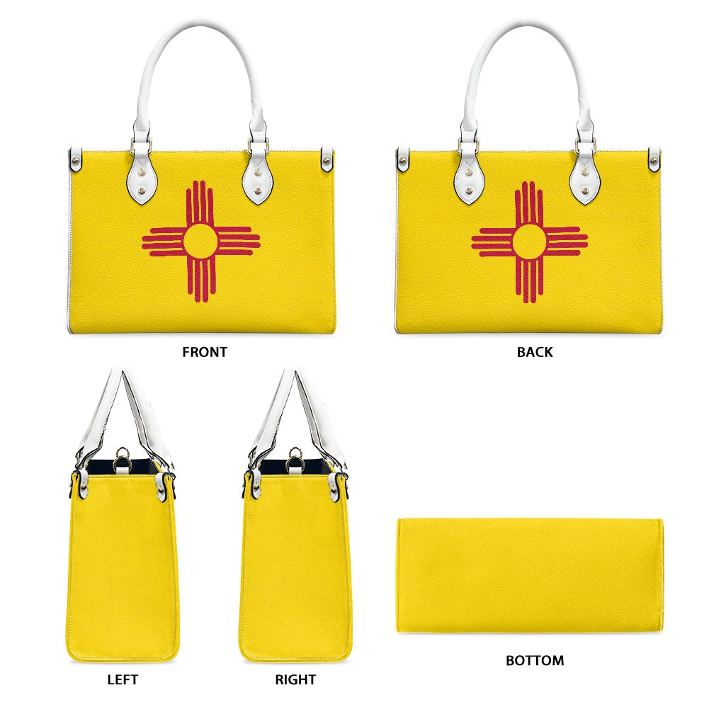 Yellow [Brand] handbag with Zia symbol, shown all angles.