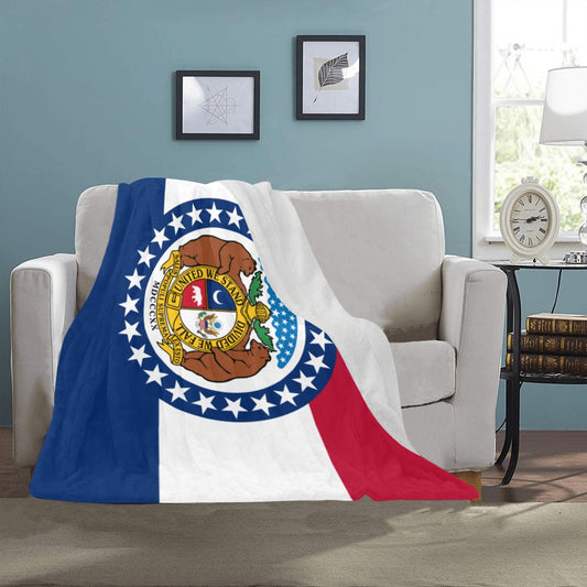 Cozy blanket featuring Missouri flag, draped on sofa. [Luv My Flag]