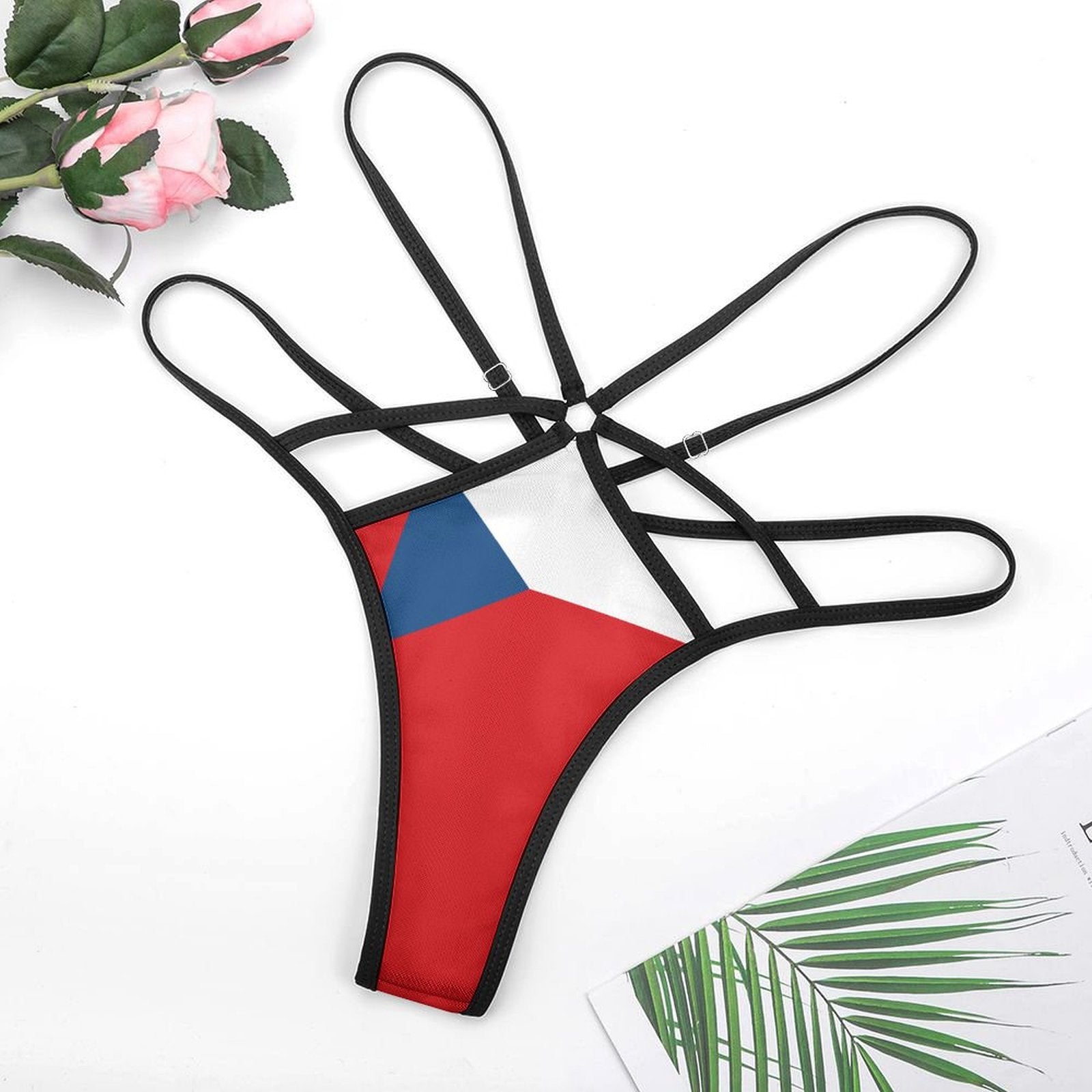 Red, white, blue [Brand] bikini with black strappy design.