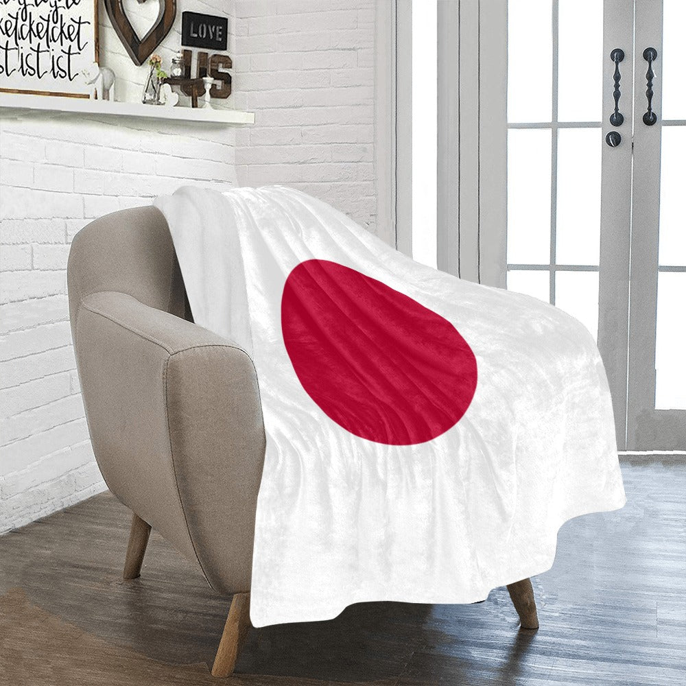 Stylish chair with Luv My Flag Japan-themed blanket.