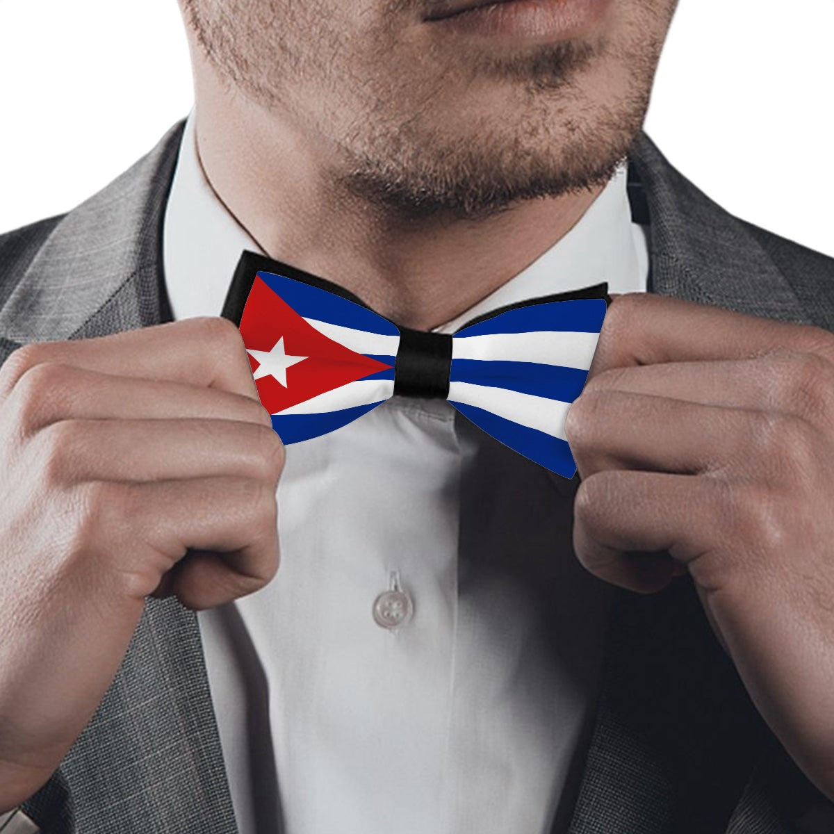 Man adjusting [Brand] bow tie with Cuban flag design.