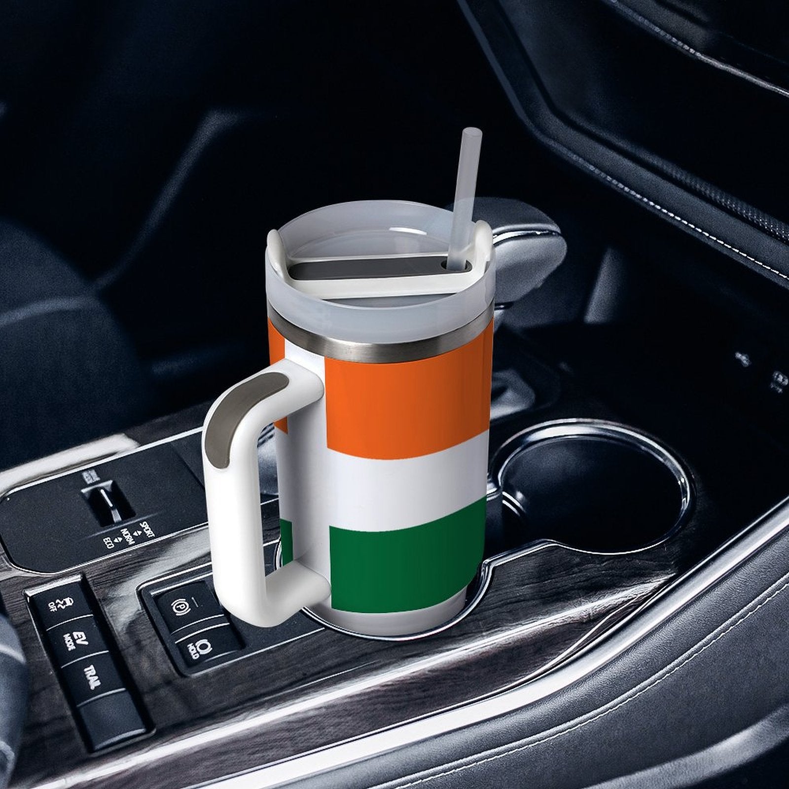 [Brand] mug with straw in car cup holder, striped.