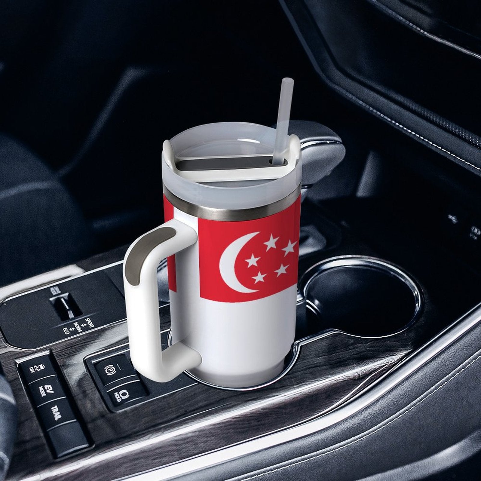[Brand] travel mug with Singapore flag in car holder.