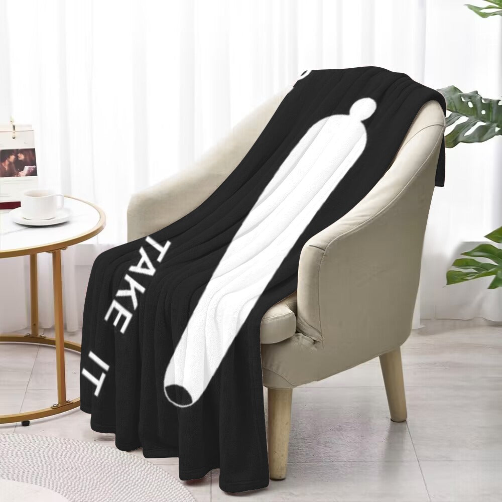 Luv My Flag blanket with unique design on chair.