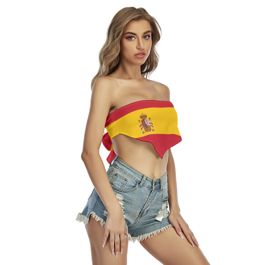 Woman in [Brand] Spanish flag top with denim shorts.