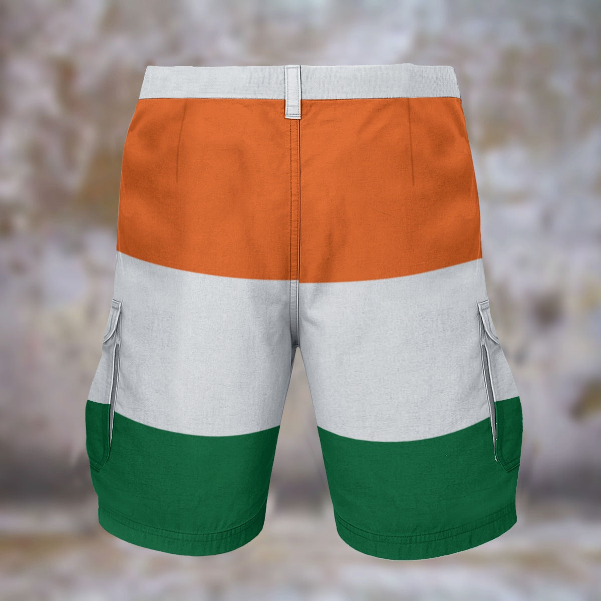 [Brand] shorts featuring orange, white, and green color scheme.