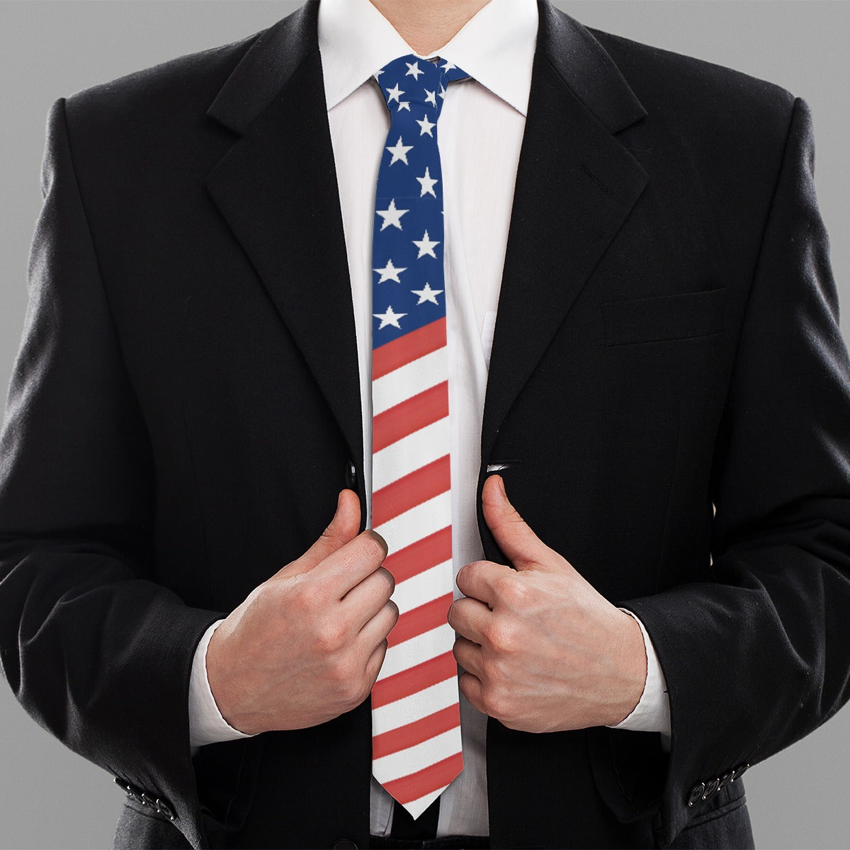 Businessman wearing [Brand] American flag tie and black suit.
