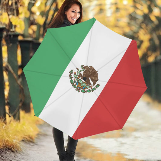 Smiling woman holds umbrella with Mexican flag by [Brand].