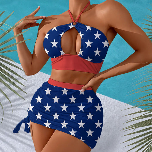Woman in [Brand] star-patterned swimwear with palm leaves background.