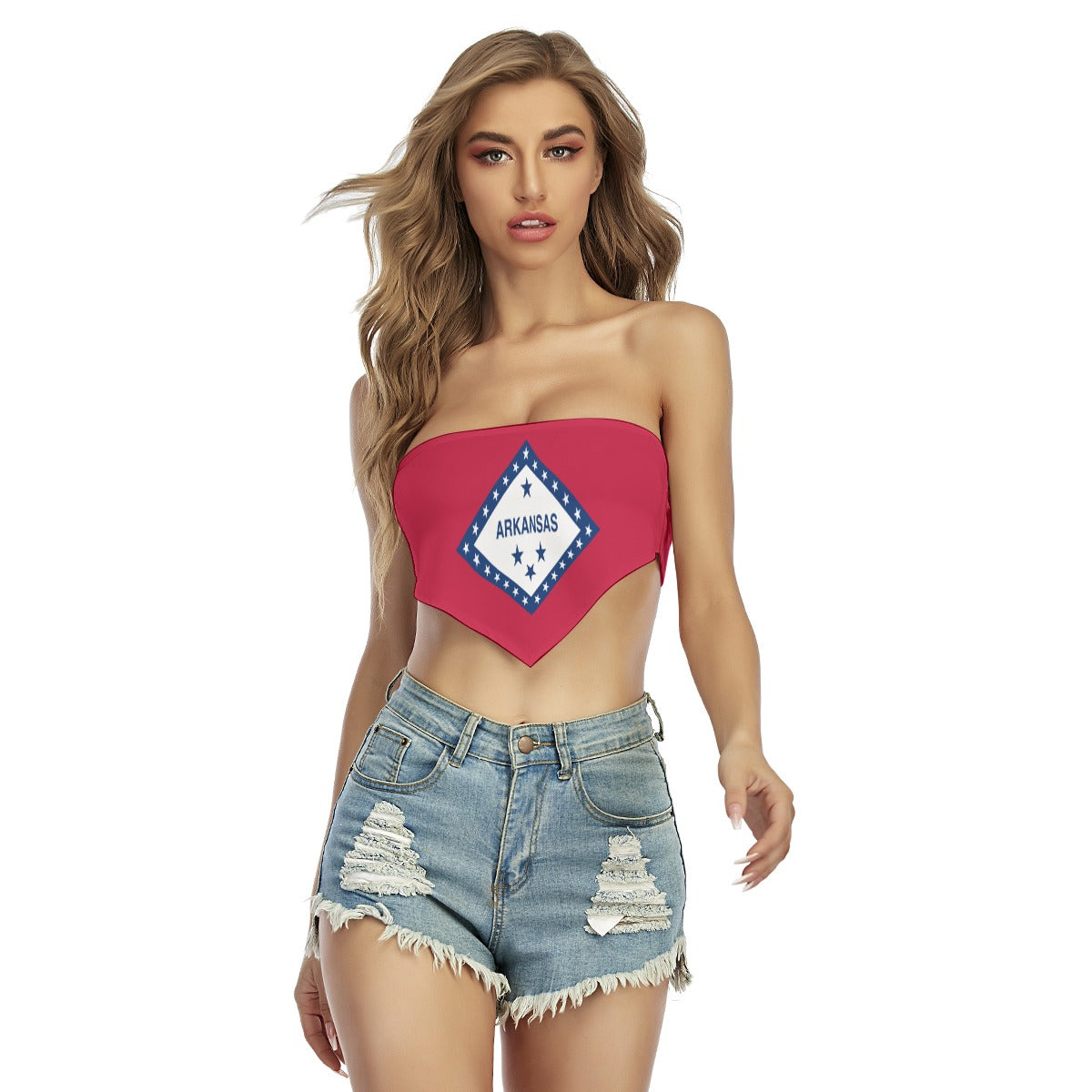 Young woman in [Brand] Arkansas top and denim shorts.