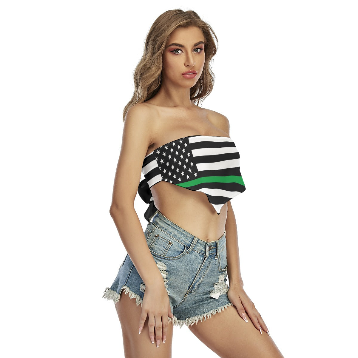 A model in [Brand] flag top and denim shorts.
