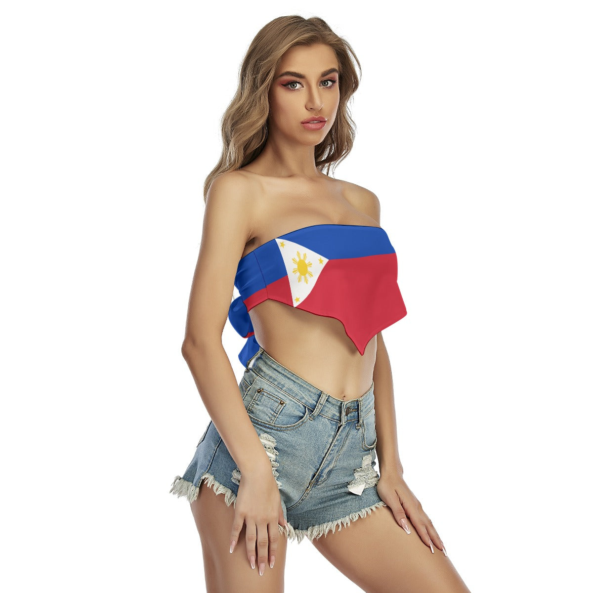 Female model wearing [Brand] flag-themed top and denim shorts.