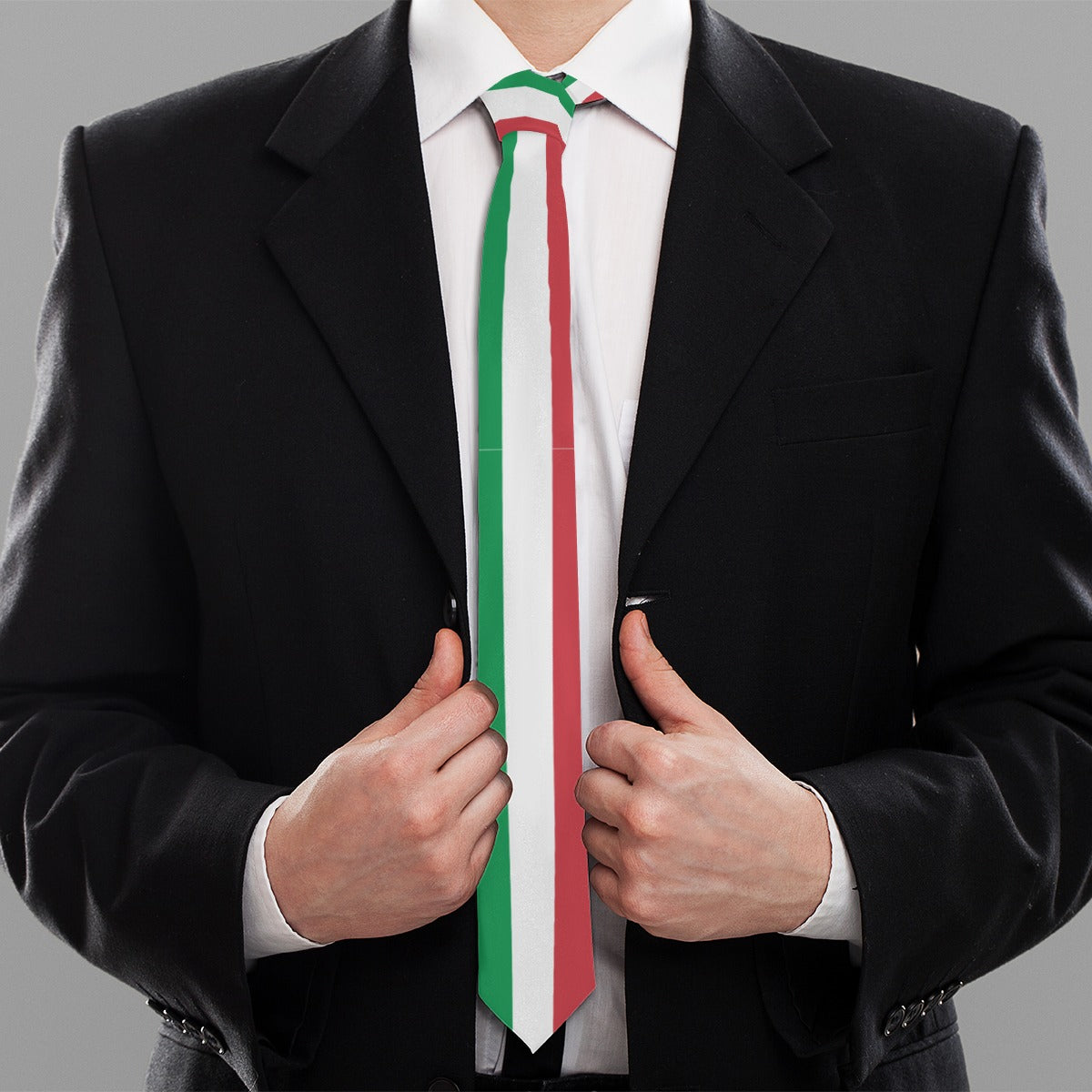 Man wearing suit with [Brand] Italian flag-themed necktie, gray background.