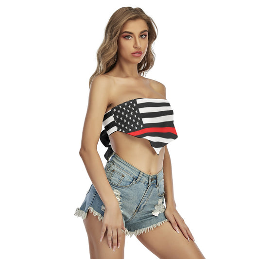 Woman wearing [Brand] flag top and denim shorts stylishly.