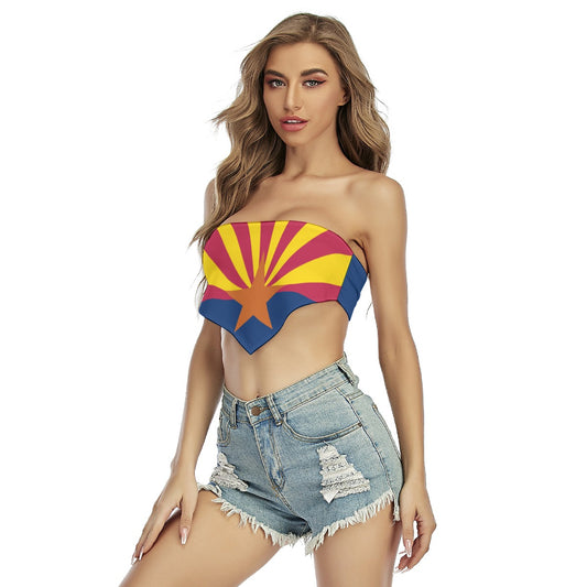 Woman modeling [Brand] bandeau top and distressed denim shorts.