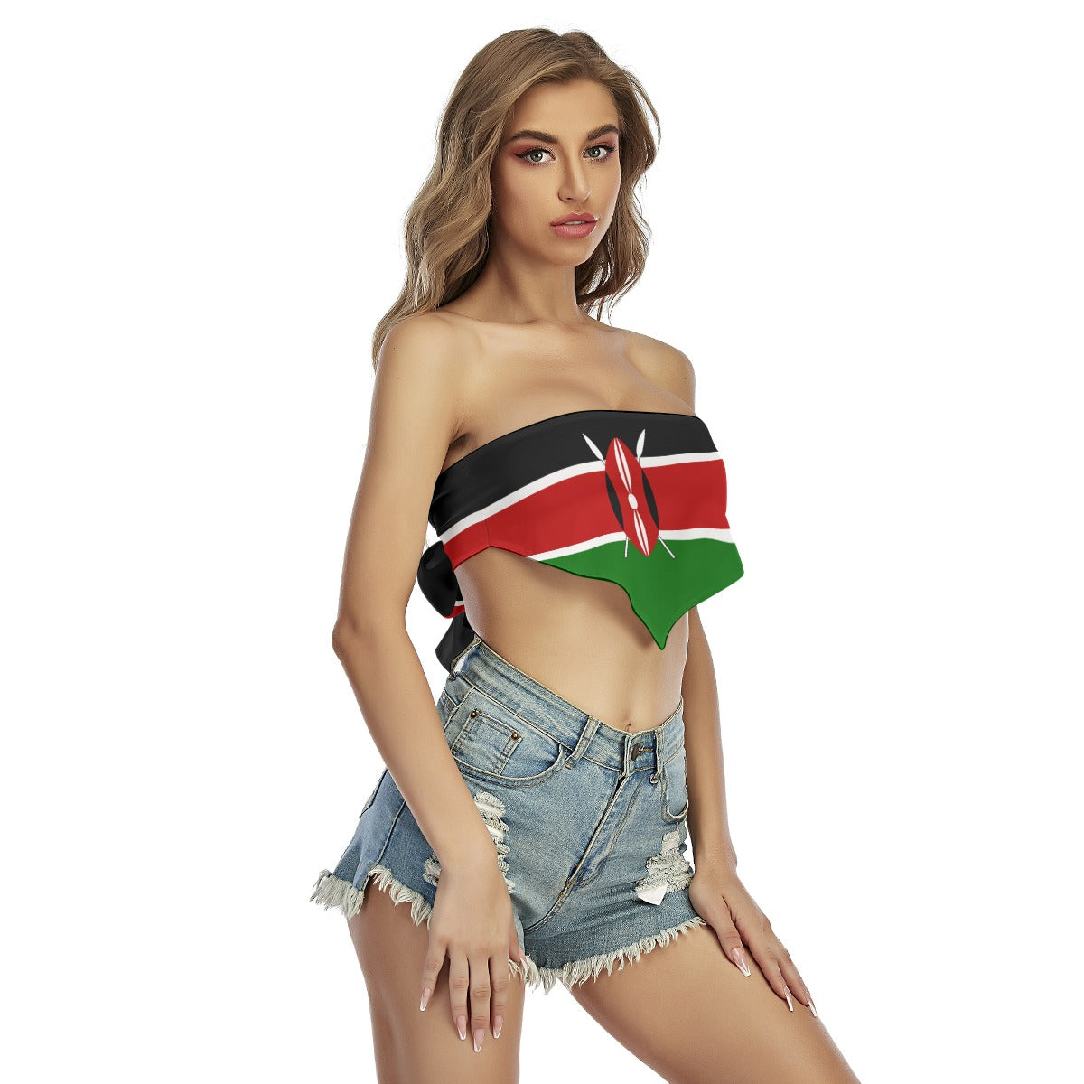 Woman in [Brand] top, Kenyan flag design, denim shorts.