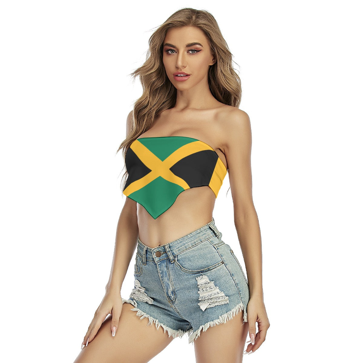Woman in [Brand] Jamaican flag top, denim shorts modeling.