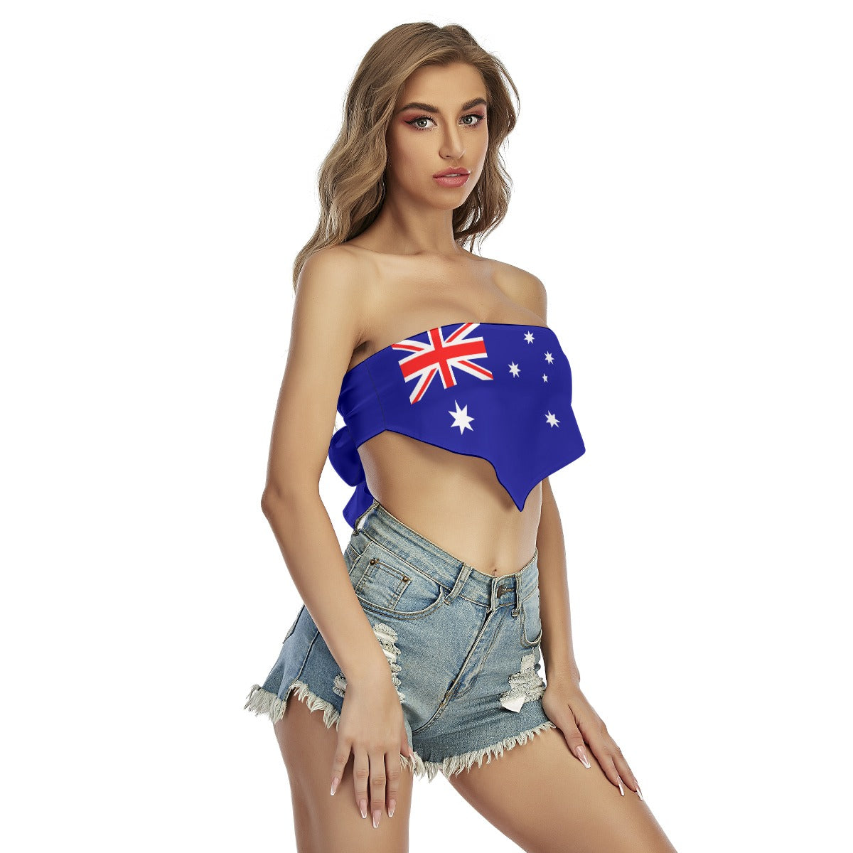 Woman in [Brand] Australian flag top, denim shorts, posing confidently.