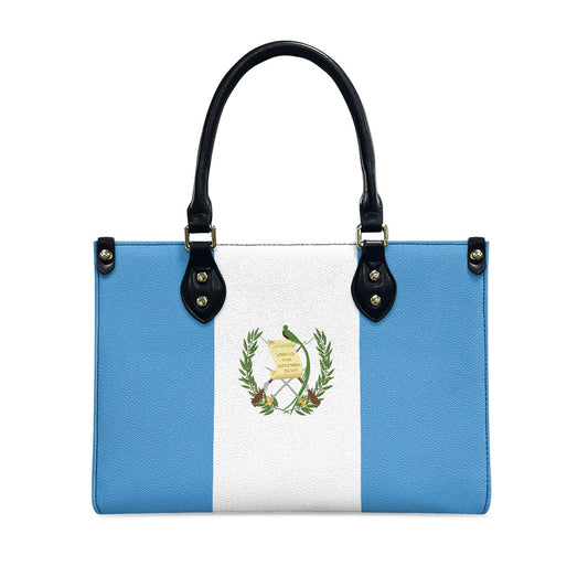 [Brand] handbag with Guatemalan flag design and black handles.