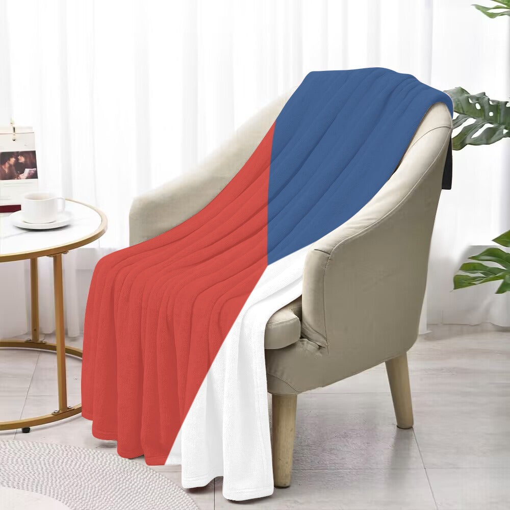 Luv My Flag throw blanket draped over a chair.