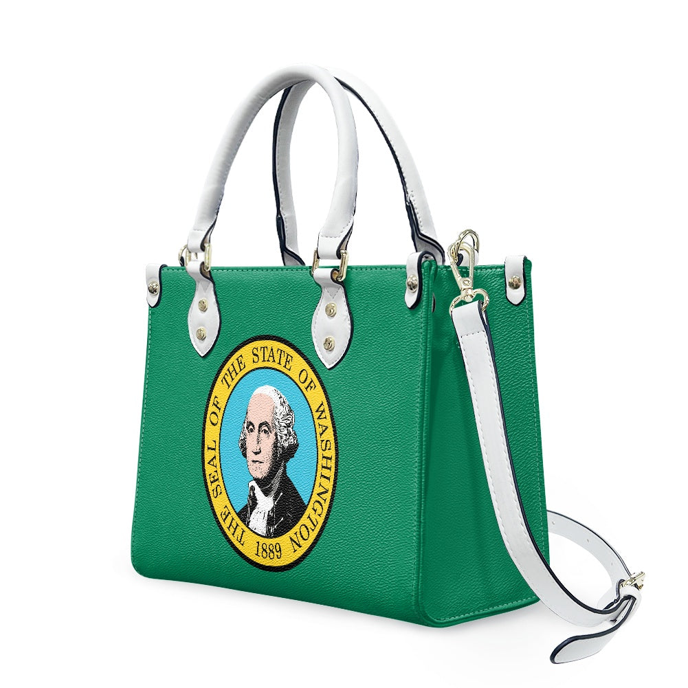 Green handbag featuring Washington State Seal, by [Brand].