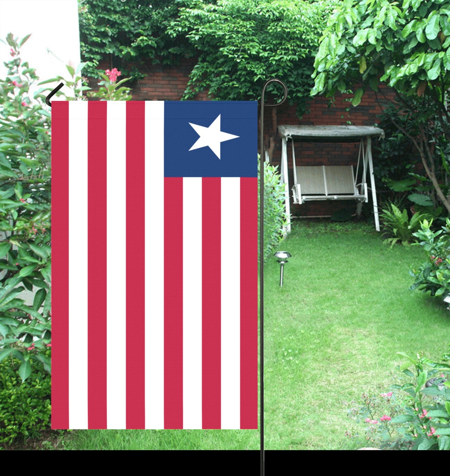 Red-striped [Luv My Flag] garden flag with white star displayed.