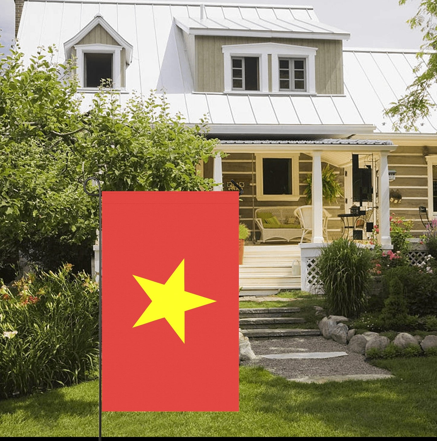Red flag with yellow star outside charming house. Luv My Flag.