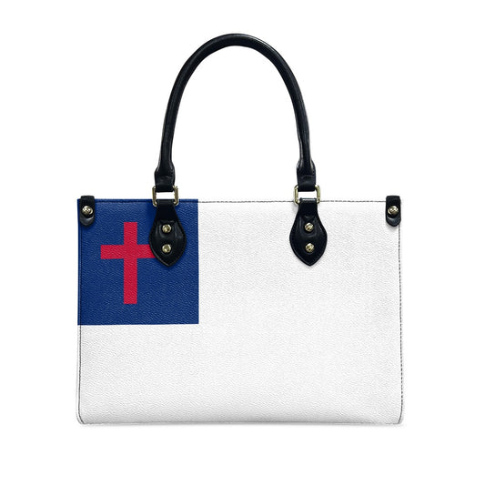 [Brand] handbag with Christian flag design and black handles.