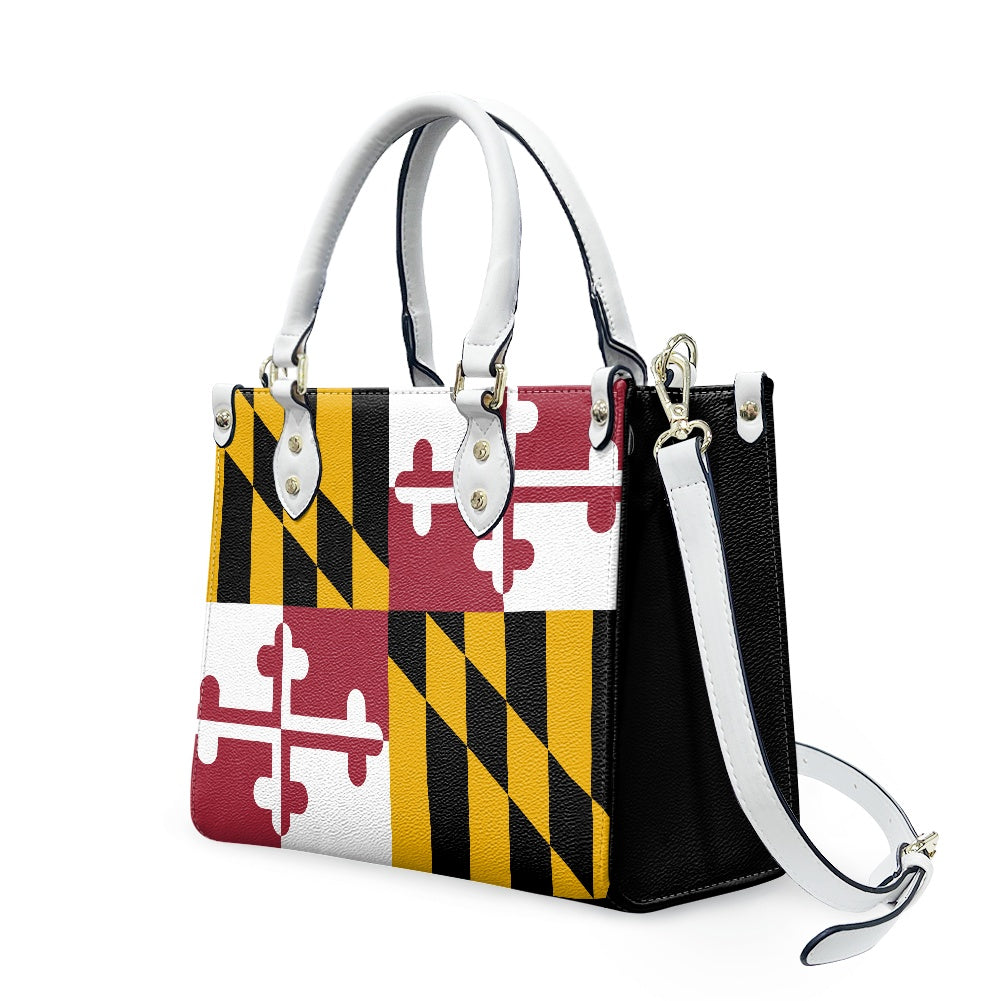 [Brand] handbag featuring Maryland flag design with white straps.