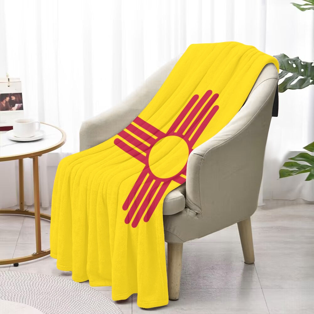 [Luv My Flag] yellow blanket with red symbol, draped chair.