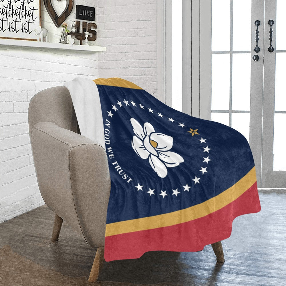 Luv My Flag blanket featuring Mississippi flag design on chair.
