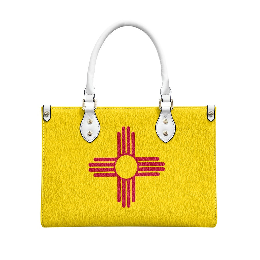 Yellow handbag with red design, white handles, by [Brand].