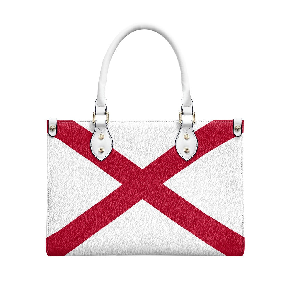 [Brand] handbag with red cross design, white background.