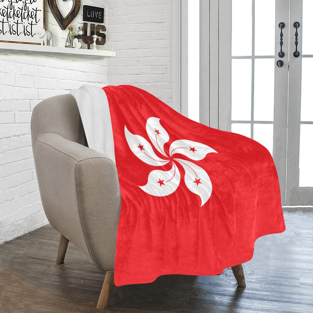 Cozy chair with Luv My Flag Hong Kong blanket.