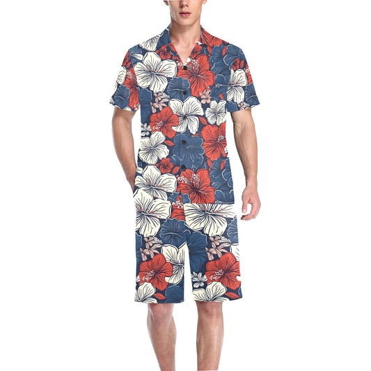 Male model in [Brand] floral Hawaiian shirt and shorts.