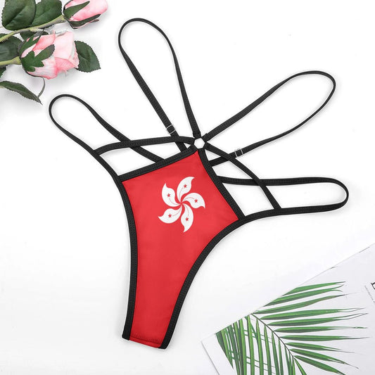 Red strappy thong with floral emblem, by [Brand].