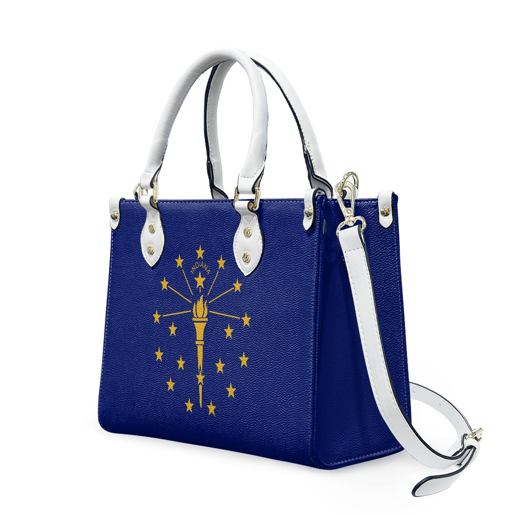 Blue handbag featuring Indiana flag, white handles, [Brand].
