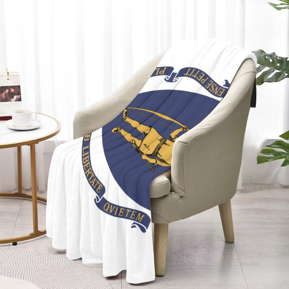 Luv My Flag blanket with design draped on chair.