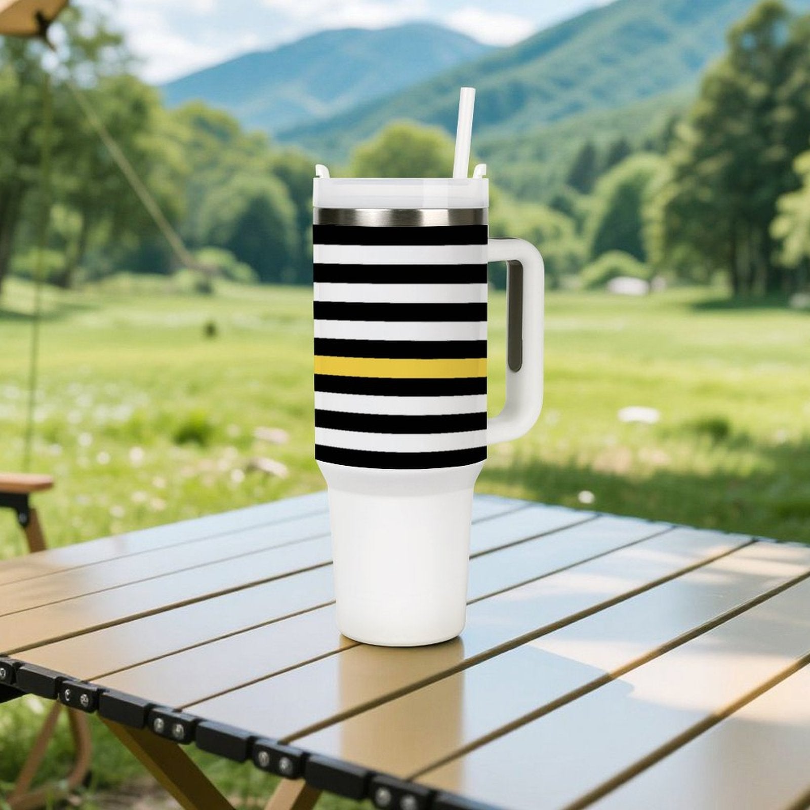 [Brand] mug with stripes on a wooden outdoor table.
