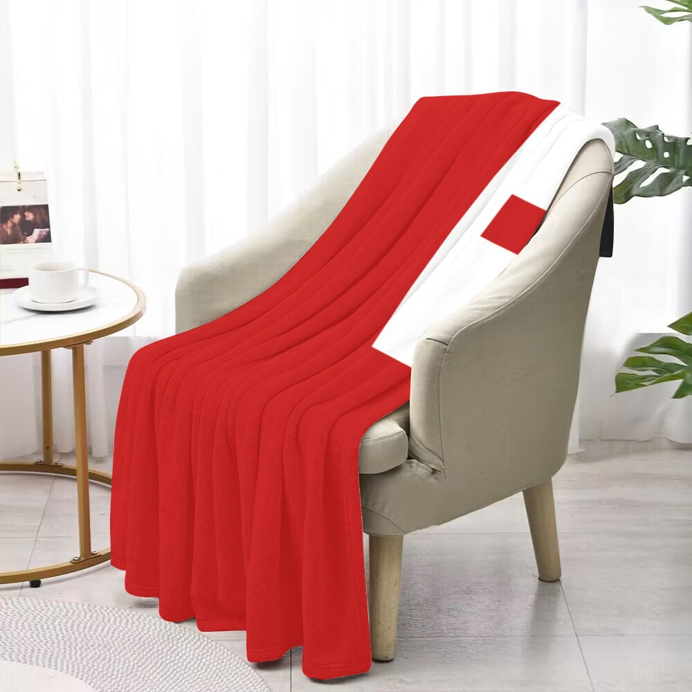 Red and white blanket draped over chair, Luv My Flag.