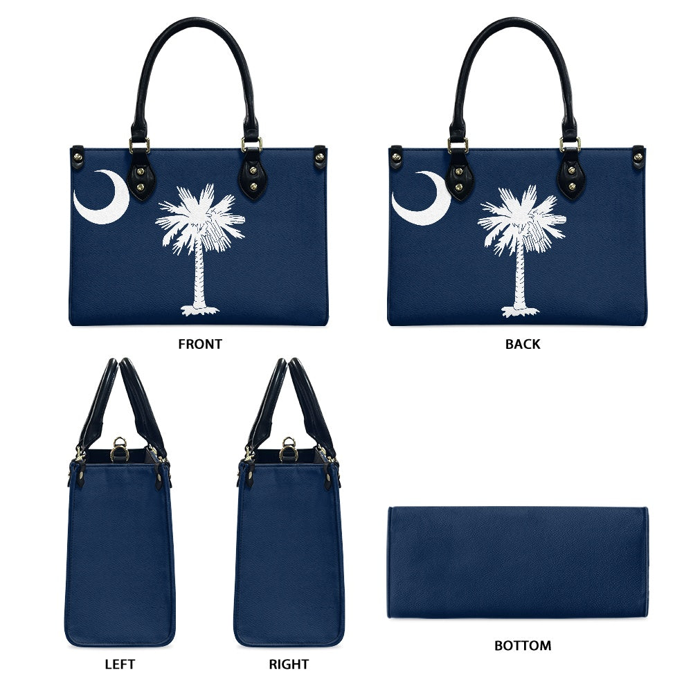 Blue [Brand] handbag featuring palm tree and crescent moon.