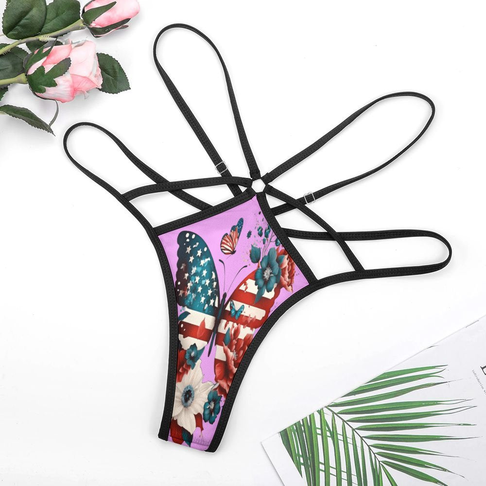 [Brand] butterfly pattern thong with floral accents and straps.