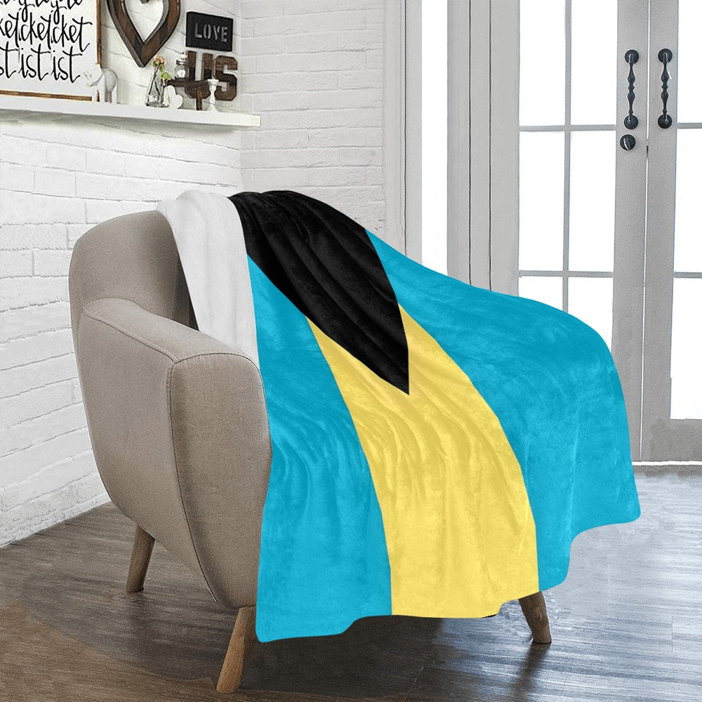 [Luv My Flag] Bahamas-themed blanket draped over beige chair.